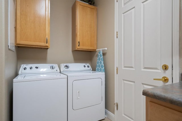 115 Durango Trl, Georgetown, TX 78633 - laundry room with cabinet space and washer and dryer