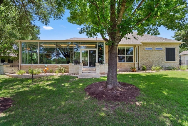 115 Durango Trl, Georgetown, TX 78633 - back of house featuring a sunroom