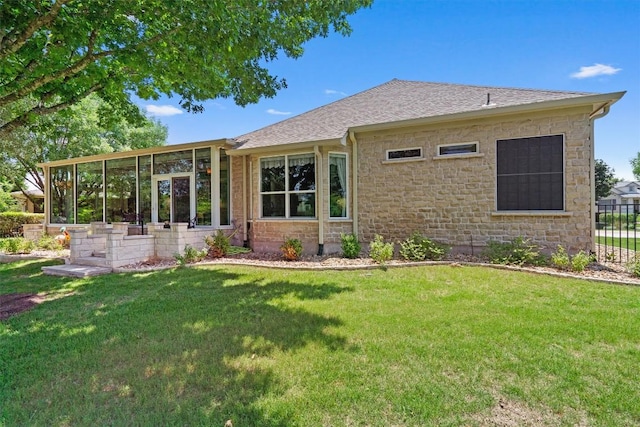 115 Durango Trl, Georgetown, TX 78633 - rear view of property featuring stone siding, a sunroom, and roof with shingles