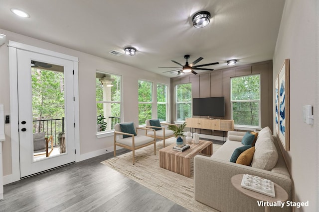 182 Kaanapali Ln, Bastrop, TX 78602 - living area with wood finished floors, a ceiling fan, and recessed lighting