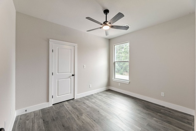 182 Kaanapali Ln, Bastrop, TX 78602 - empty room featuring a ceiling fan and wood finished floors