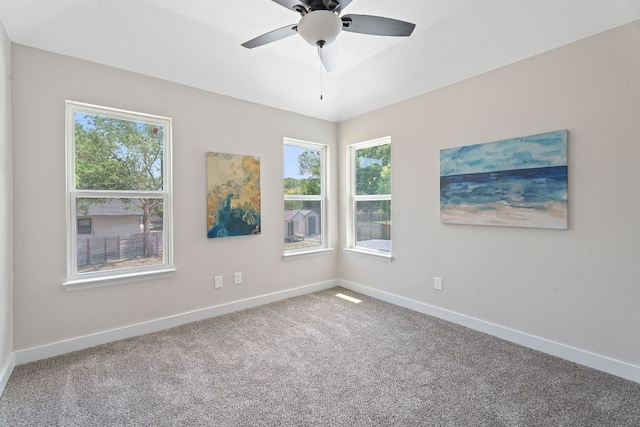 100 Toltec Cv, Kyle, TX 78640 - carpeted spare room featuring baseboards and ceiling fan