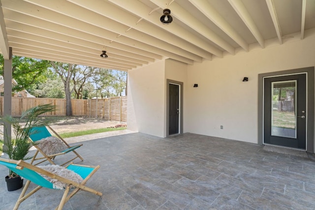 100 Toltec Cv, Kyle, TX 78640 - fenced backyard with a patio area
