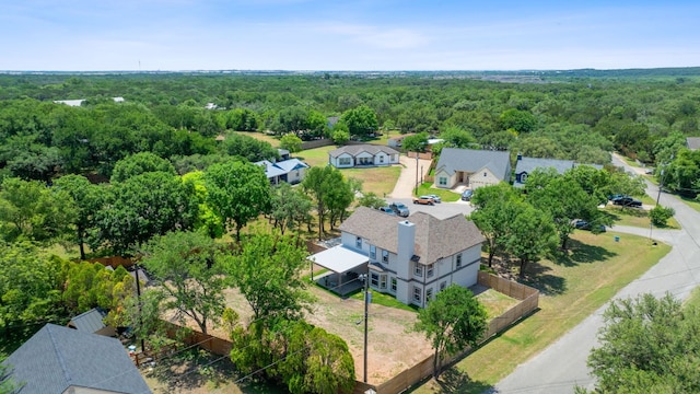100 Toltec Cv, Kyle, TX 78640 - view from above of property with a heavily wooded area