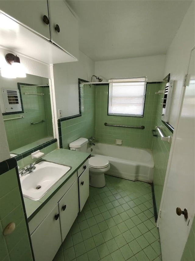405 Oertli Ln, Austin, TX 78753 - bathroom with vanity, tile patterned floors, bathtub / shower combination, and toilet