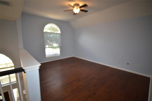 840 Smoke Signal Pass, Pflugerville, TX 78660 - unfurnished room featuring ceiling fan, wood finished floors, lofted ceiling, and baseboards