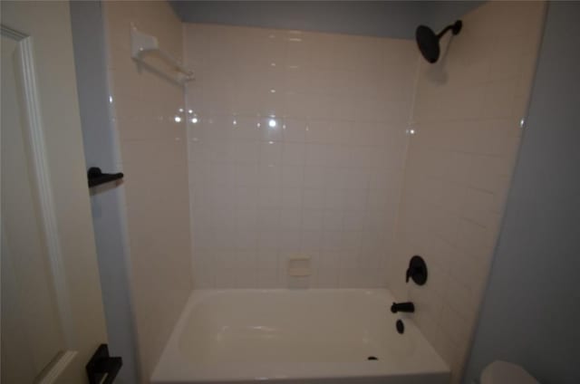 840 Smoke Signal Pass, Pflugerville, TX 78660 - bathroom featuring shower / washtub combination and toilet