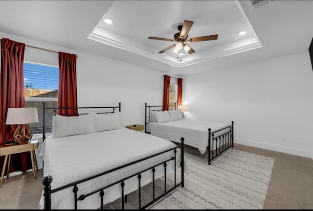 249 Hill Dr, Granite Shoals, TX 78654 - bedroom featuring recessed lighting, a tray ceiling, baseboards, and a ceiling fan