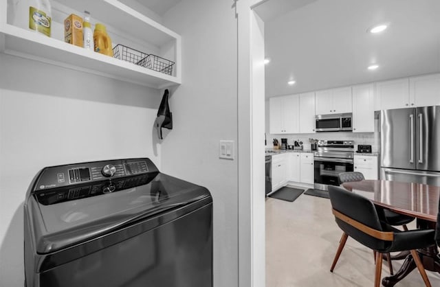 249 Hill Dr, Granite Shoals, TX 78654 - laundry room featuring washer / clothes dryer and recessed lighting