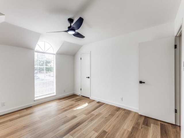 7920 Rockwood Ln Unit 208, Austin, TX 78757 - bonus room with a ceiling fan, light wood-style floors, baseboards, and vaulted ceiling