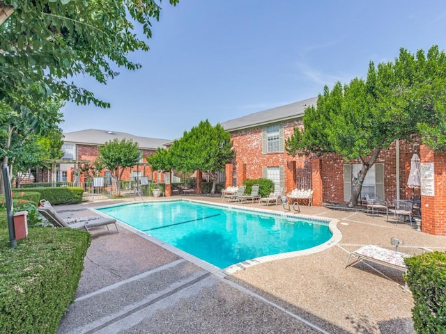 7920 Rockwood Ln Unit 208, Austin, TX 78757 - community pool with a patio area
