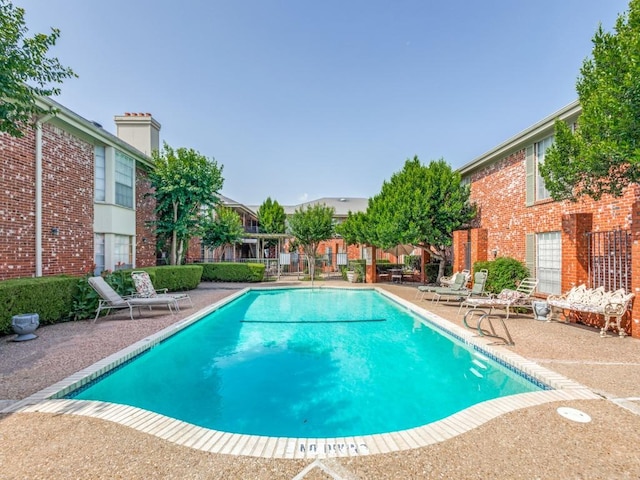 7920 Rockwood Ln Unit 208, Austin, TX 78757 - community pool with a patio area
