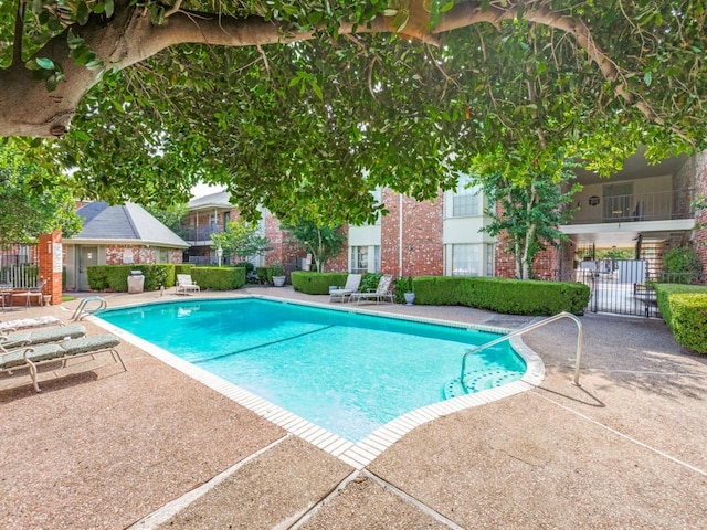 7920 Rockwood Ln Unit 208, Austin, TX 78757 - community pool with a patio area