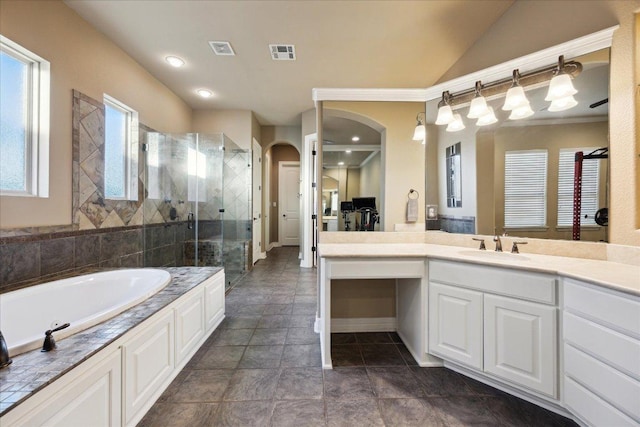 613 Horseback Holw, Austin, TX 78732 - full bathroom featuring a stall shower, vanity, a bath, lofted ceiling, and crown molding