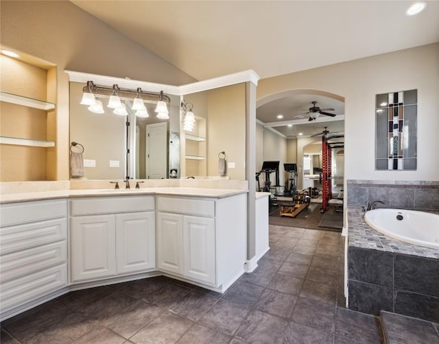 613 Horseback Holw, Austin, TX 78732 - full bath with ceiling fan, a garden tub, vanity, built in shelves, and vaulted ceiling