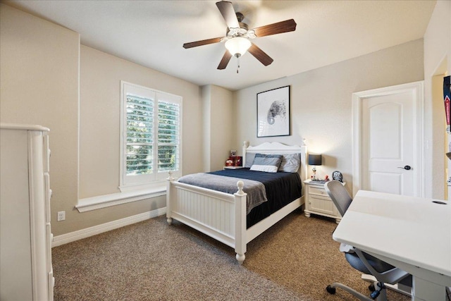 613 Horseback Holw, Austin, TX 78732 - bedroom with dark carpet, a ceiling fan, baseboards, and a desk