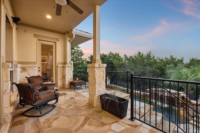 613 Horseback Holw, Austin, TX 78732 - balcony featuring a ceiling fan