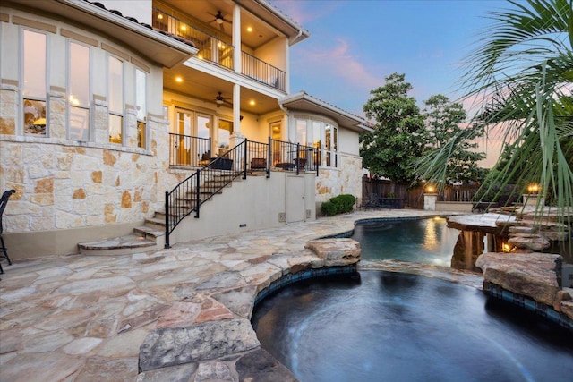 613 Horseback Holw, Austin, TX 78732 - view of swimming pool featuring stairway, ceiling fan, french doors, a patio area, and a pool with connected hot tub