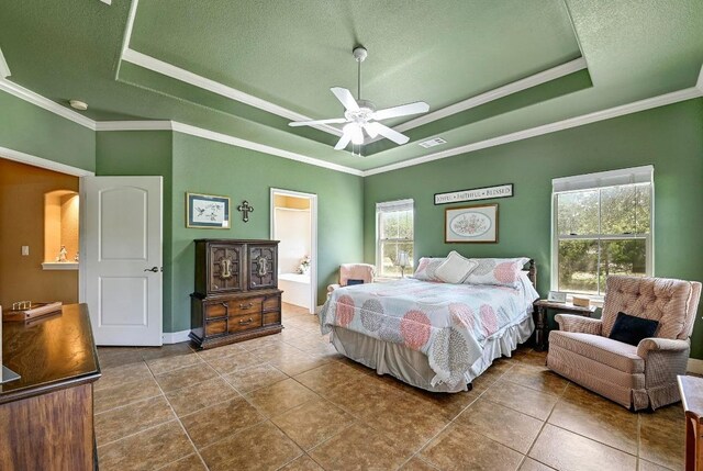 217 Circle Oaks Dr, Burnet, TX 78611 - bedroom with a raised ceiling, crown molding, dark tile patterned floors, baseboards, and a ceiling fan
