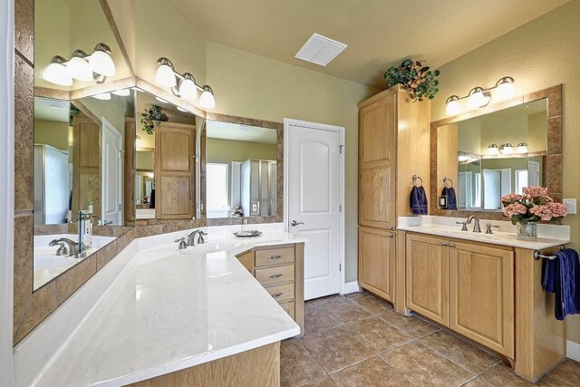 217 Circle Oaks Dr, Burnet, TX 78611 - bathroom featuring vanity and tile patterned floors