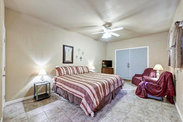 217 Circle Oaks Dr, Burnet, TX 78611 - bedroom featuring baseboards and a ceiling fan