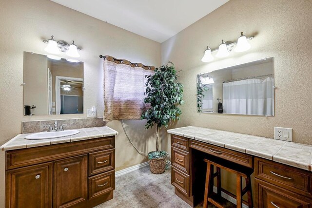 217 Circle Oaks Dr, Burnet, TX 78611 - bathroom featuring vanity and curtained shower