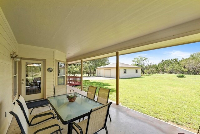 217 Circle Oaks Dr, Burnet, TX 78611 - view of patio featuring outdoor dining space and an outdoor structure