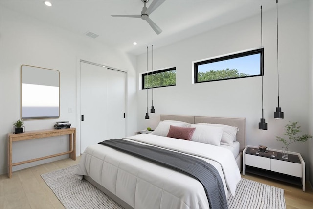 2010 Oxford Ave, Austin, TX 78704 - bedroom with recessed lighting, light wood finished floors, a closet, and a ceiling fan