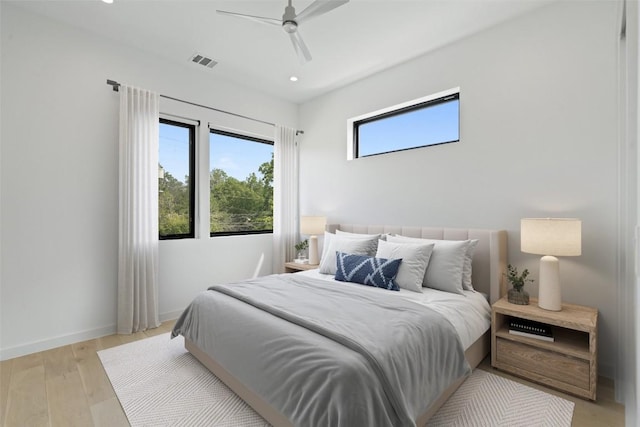 2010 Oxford Ave, Austin, TX 78704 - bedroom with recessed lighting, light wood-style floors, a ceiling fan, and baseboards