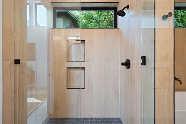 2010 Oxford Ave, Austin, TX 78704 - full bathroom with a tile shower and plenty of natural light
