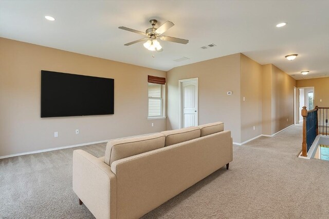 9837 Milla Cir Unit 72, Austin, TX 78748 - living room with light colored carpet, baseboards, a ceiling fan, and recessed lighting