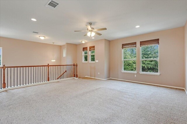 9837 Milla Cir Unit 72, Austin, TX 78748 - empty room featuring ceiling fan, carpet floors, baseboards, and recessed lighting