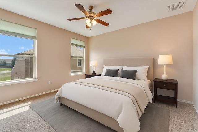 9837 Milla Cir Unit 72, Austin, TX 78748 - bedroom with carpet, baseboards, and ceiling fan