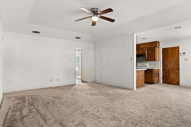 6509 Wagon Wheel Dr, Killeen, TX 76542 - unfurnished living room with ceiling fan, light carpet, and a textured ceiling