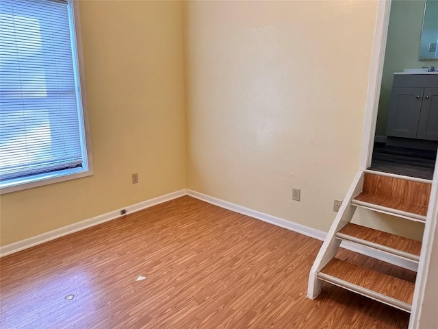 899 Hillyer St Unit 901, San Marcos, TX 78666 - staircase with wood finished floors and baseboards