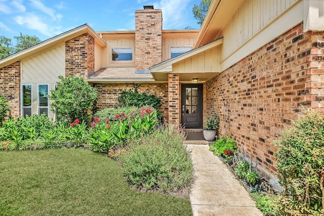 7006 Beckett Rd, Austin, TX 78749 - entrance to property with brick siding, a chimney, and a lawn