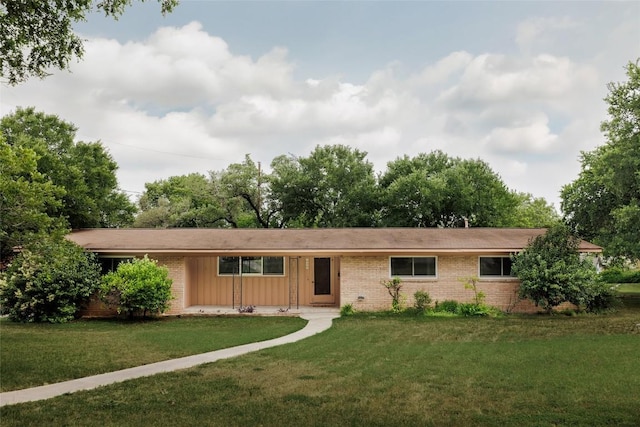 2300 Westworth Cir, Austin, TX 78704 - single story home with brick siding and a front lawn