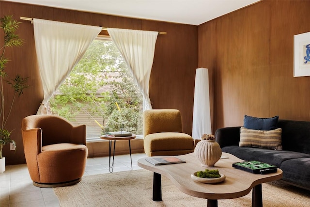 2300 Westworth Cir, Austin, TX 78704 - sitting room featuring light tile patterned flooring and wood walls