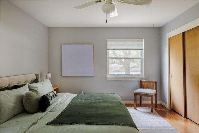 2300 Westworth Cir, Austin, TX 78704 - bedroom featuring light wood finished floors, a closet, ceiling fan, and baseboards