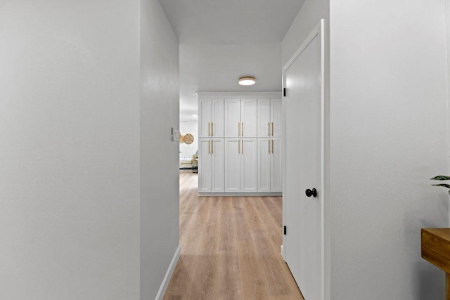 7302 Hartnell Dr, Austin, TX 78723 - hall with light wood finished floors and baseboards