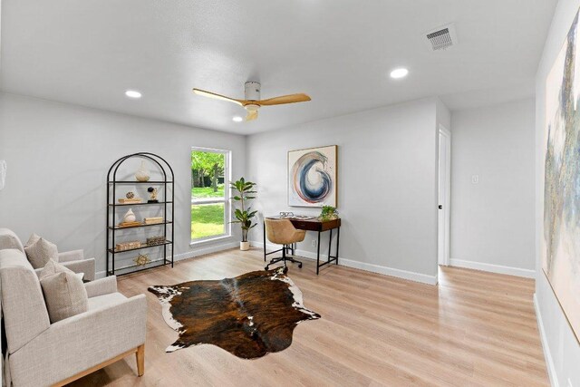 7302 Hartnell Dr, Austin, TX 78723 - sitting room with wood finished floors, a ceiling fan, recessed lighting, and baseboards