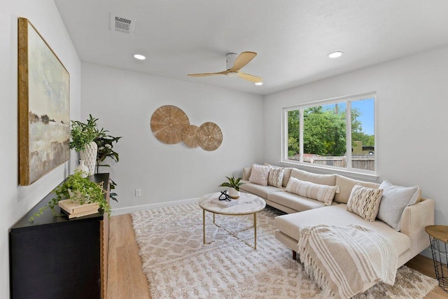 7302 Hartnell Dr, Austin, TX 78723 - living room featuring a ceiling fan, recessed lighting, wood finished floors, and baseboards