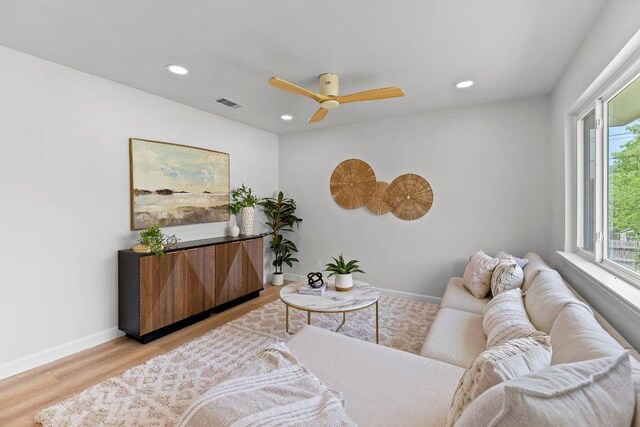 7302 Hartnell Dr, Austin, TX 78723 - living room featuring recessed lighting, a ceiling fan, baseboards, and light wood-type flooring