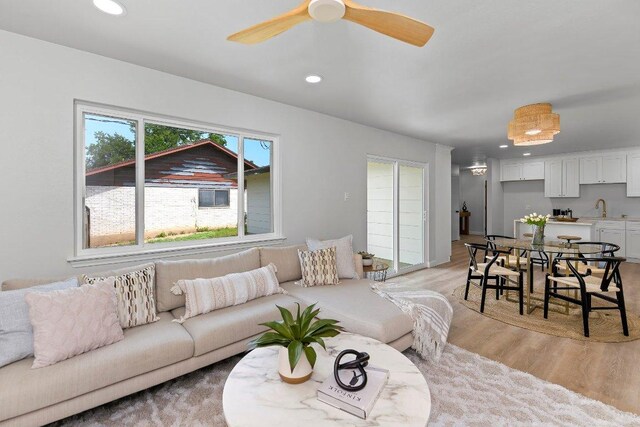 7302 Hartnell Dr, Austin, TX 78723 - living area with light wood-style floors, recessed lighting, and ceiling fan
