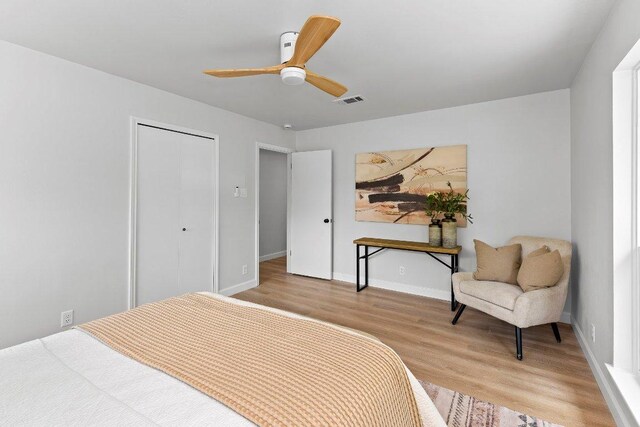 7302 Hartnell Dr, Austin, TX 78723 - bedroom with light wood-type flooring, baseboards, a ceiling fan, and a closet