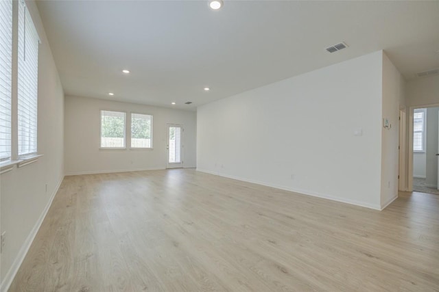 465 Brooks Ranch Dr, Kyle, TX 78640 - empty room featuring light wood finished floors and recessed lighting