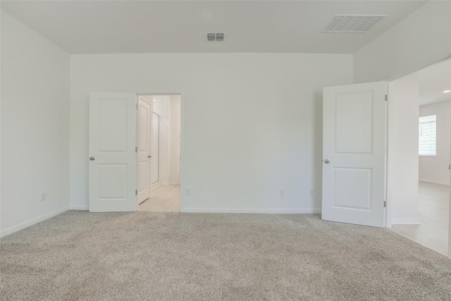465 Brooks Ranch Dr, Kyle, TX 78640 - spare room featuring light colored carpet