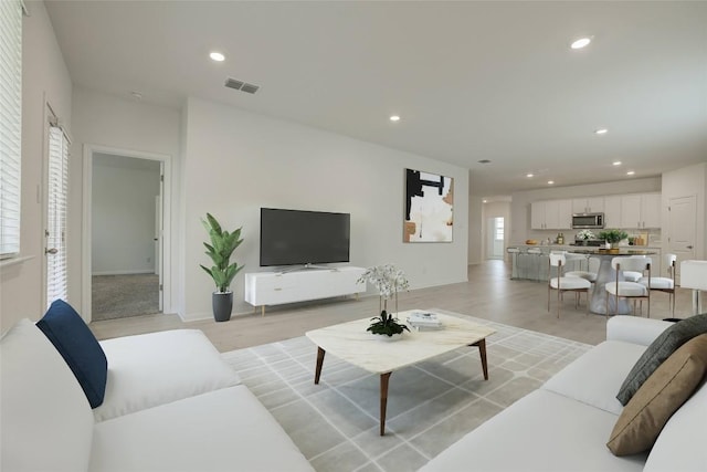 465 Brooks Ranch Dr, Kyle, TX 78640 - living area featuring recessed lighting and light wood finished floors
