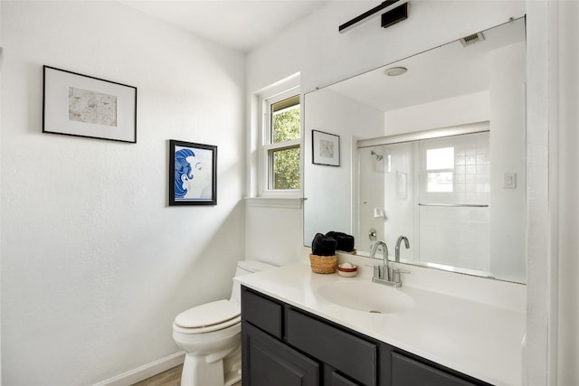 8504 Verona Trl, Austin, TX 78749 - bathroom with vanity and a shower with door