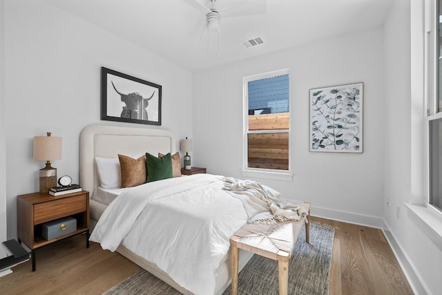 2105 Sl Davis Ave Unit 1, Austin, TX 78702 - bedroom featuring wood finished floors and a ceiling fan